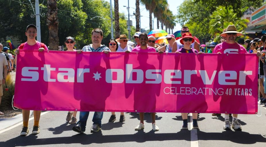 Star Observer banner at parade.