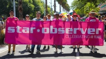 Star Observer banner at parade.